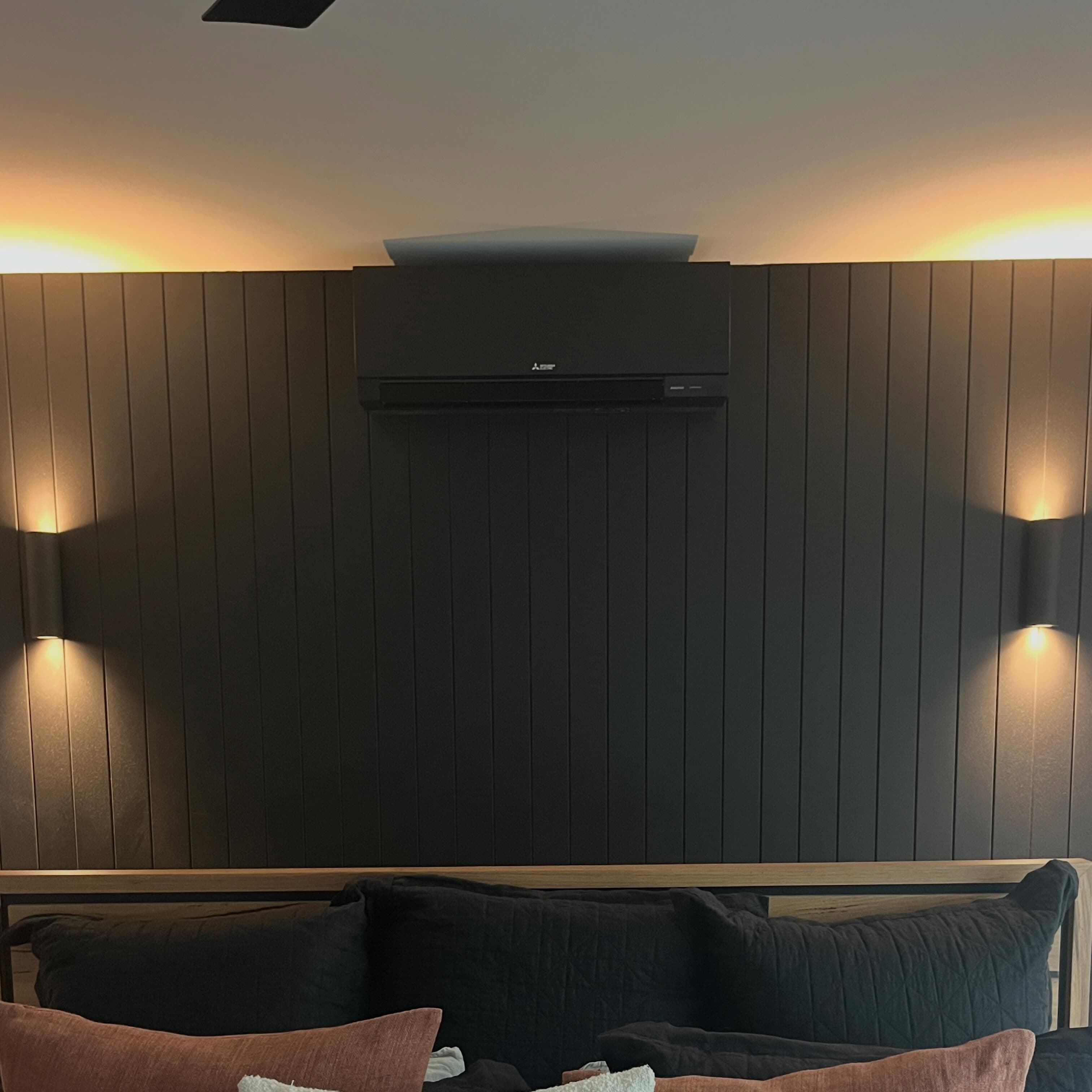 Black split system air conditioning installed by Hughes Electrical in a Moama home