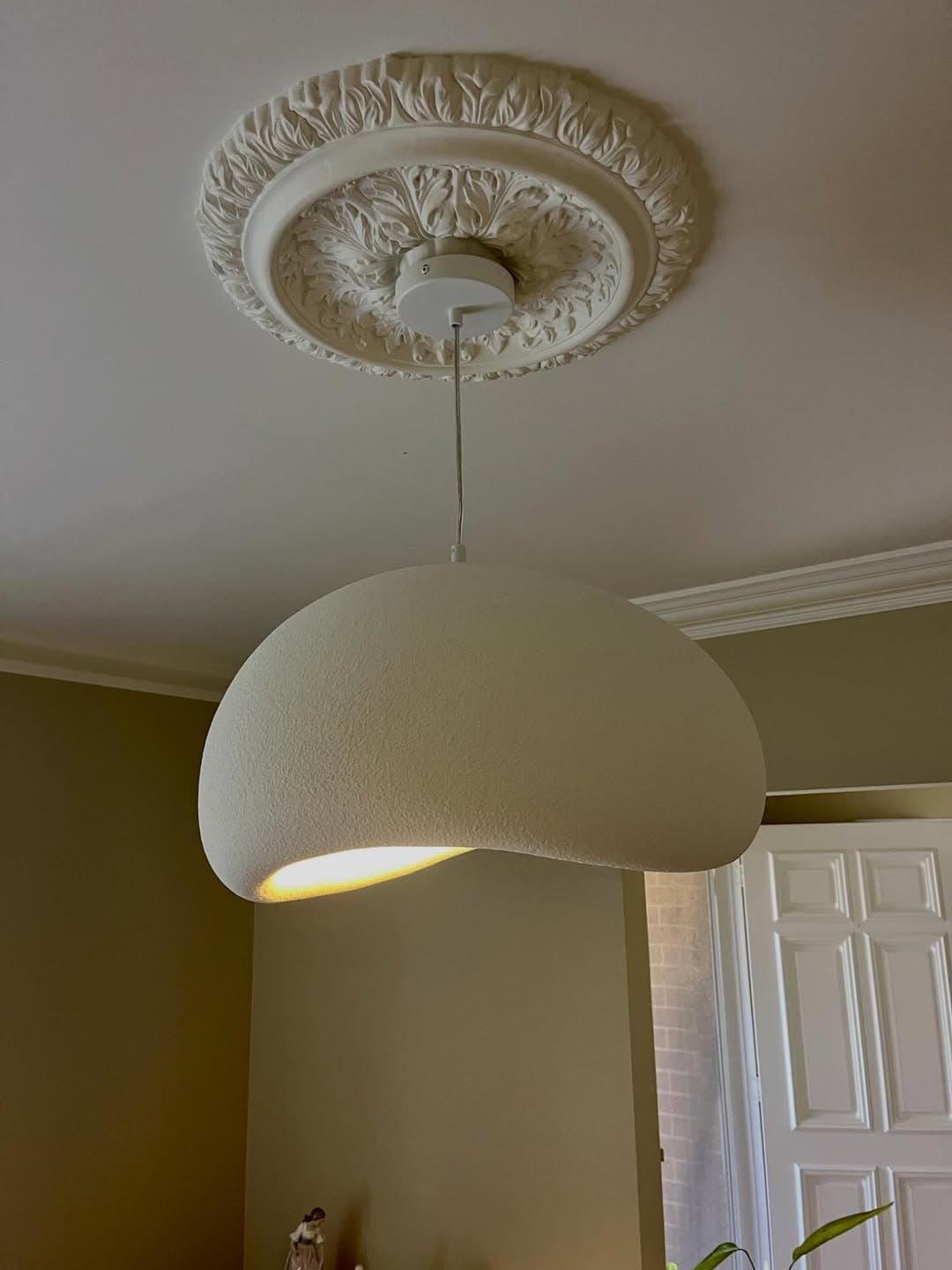 Residential electrician installing pendant lighting in an Echuca home